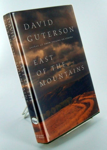 Item #1408 EAST OF THE MOUNTAINS. David GUTERSON.