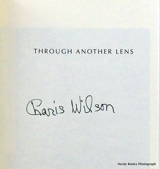 THROUGH ANOTHER LENS/SIGNED