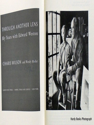 THROUGH ANOTHER LENS/SIGNED