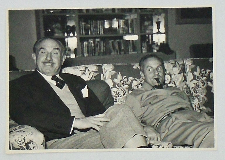 Item #2632 ORIGINAL CANDID PHOTOGRAPH OF MOVIE MOGULS JACK L. WARNER AND DARRYL F. ZANUCK. Circa 1955. Jack L. WARNER, Darryl F. ZANUCK.