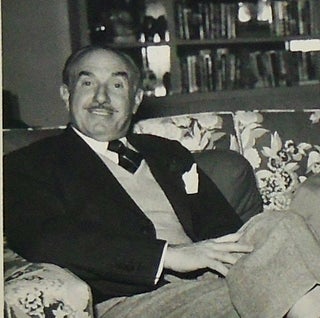 ORIGINAL CANDID PHOTOGRAPH OF MOVIE MOGULS JACK L. WARNER AND DARRYL F. ZANUCK. Circa 1955.